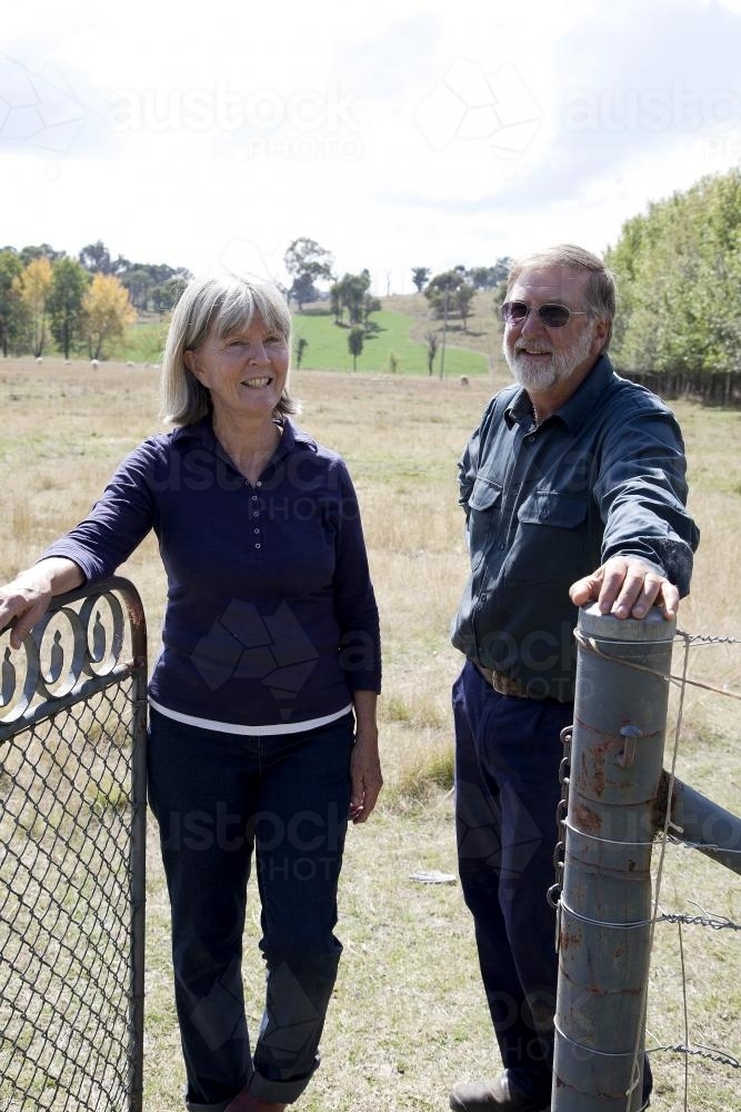 Portrait of a middle aged couple outside on a rural farm - Australian Stock Image