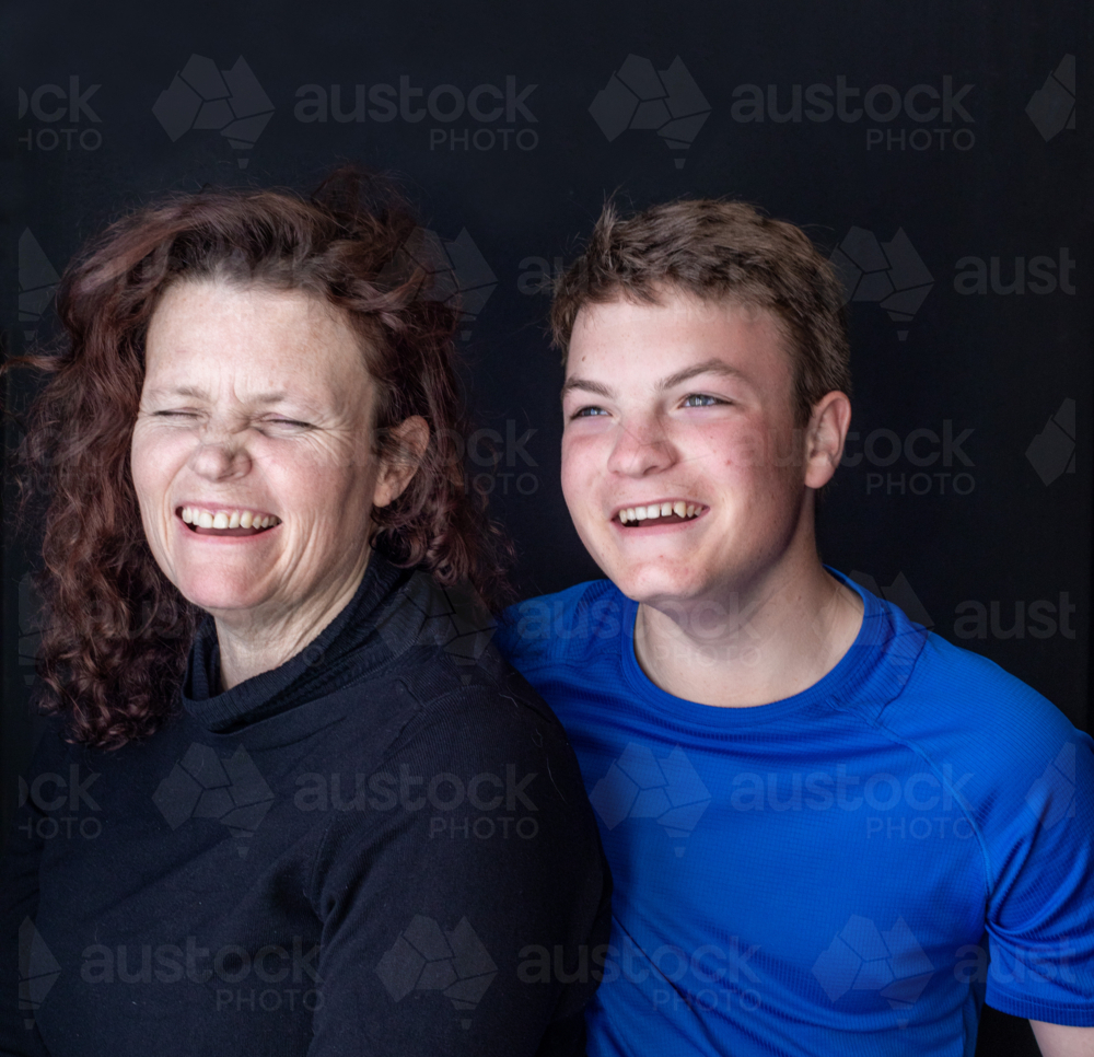 Portrait of a mother and son laughing - Australian Stock Image