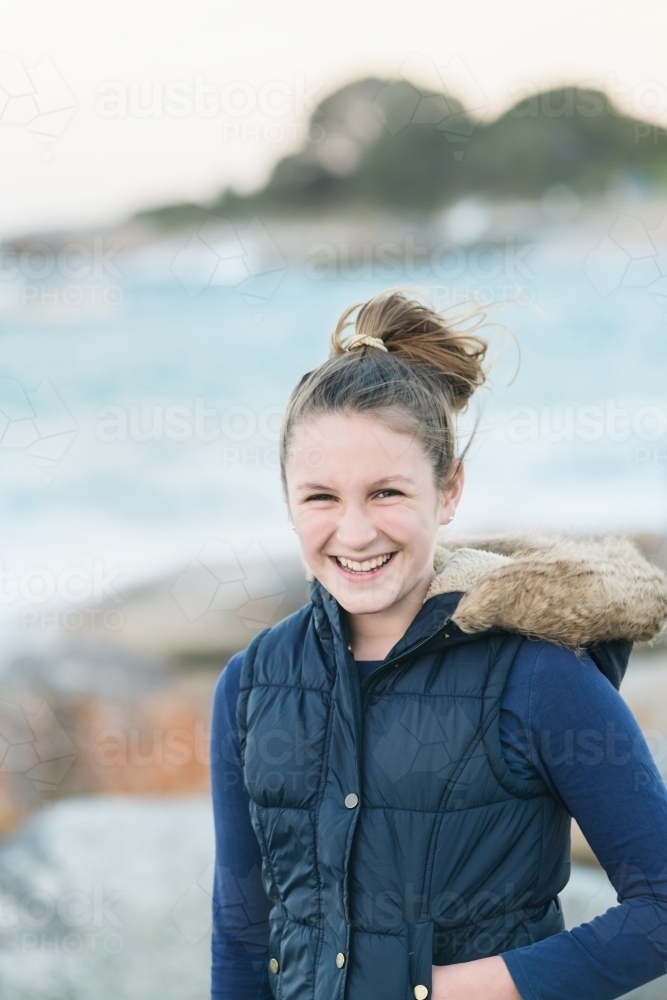 portrait of a pretty teen girl by the sea - Australian Stock Image