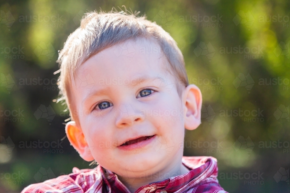 Portrait of a smiling little boy - Australian Stock Image