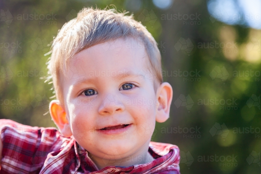 Portrait of a smiling little boy - Australian Stock Image