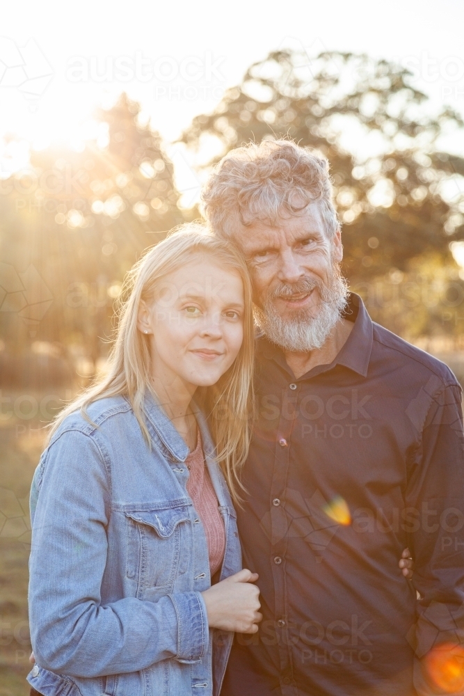Portrait of a smiling man and his daughter - Australian Stock Image