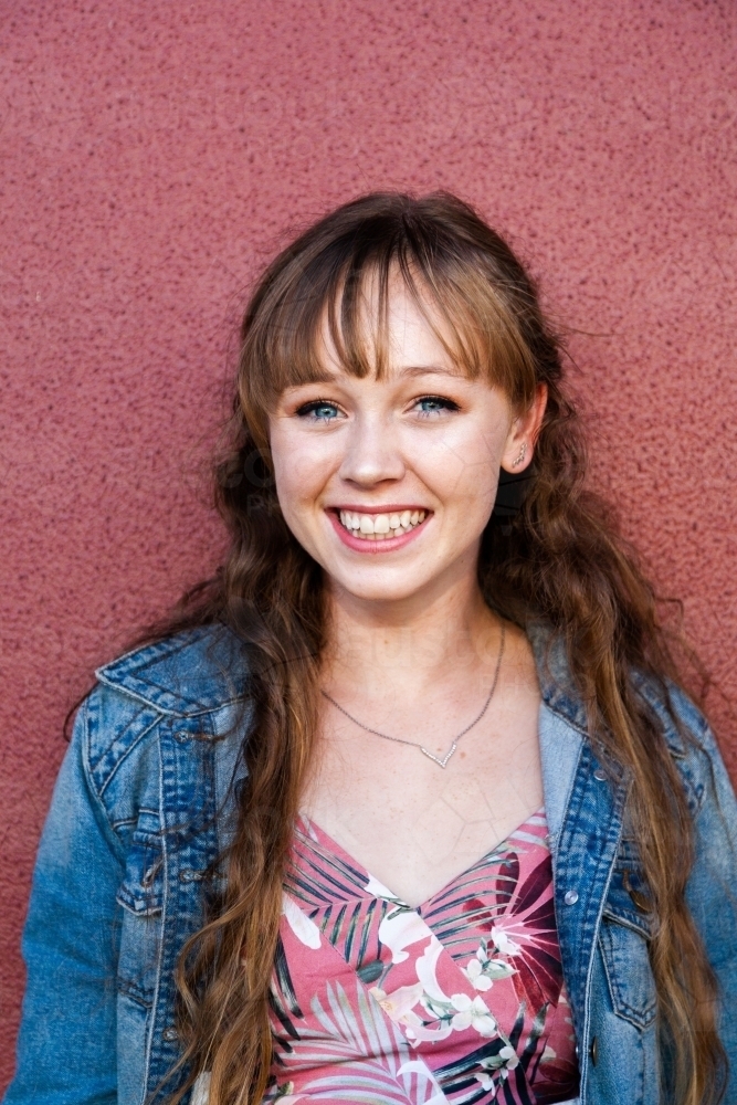 Portrait of a smiling young woman in her late teens - Australian Stock Image