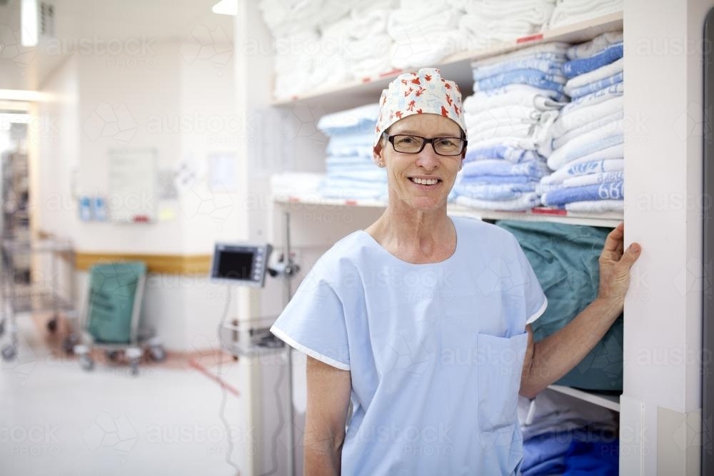 Portrait of a theatre nurse in a hospital operating theatre - Australian Stock Image