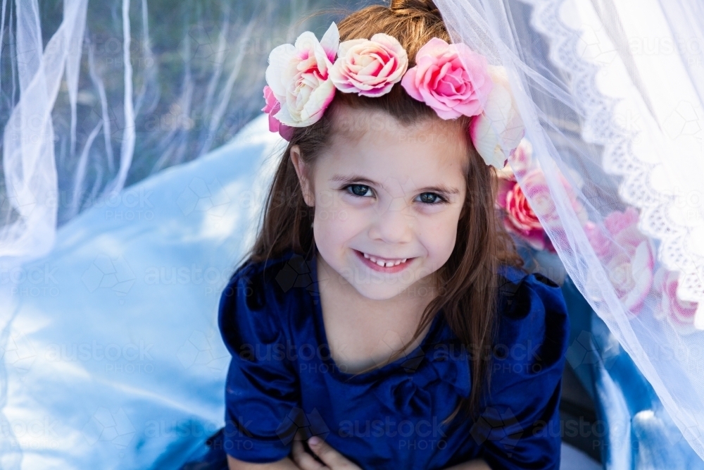 Portrait of a young girl in a floral headpiece - Australian Stock Image