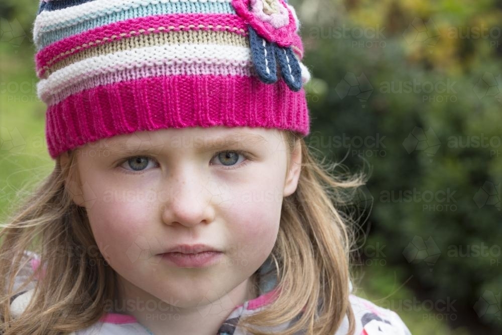 Portrait of a young girl wearing a beanie - Australian Stock Image
