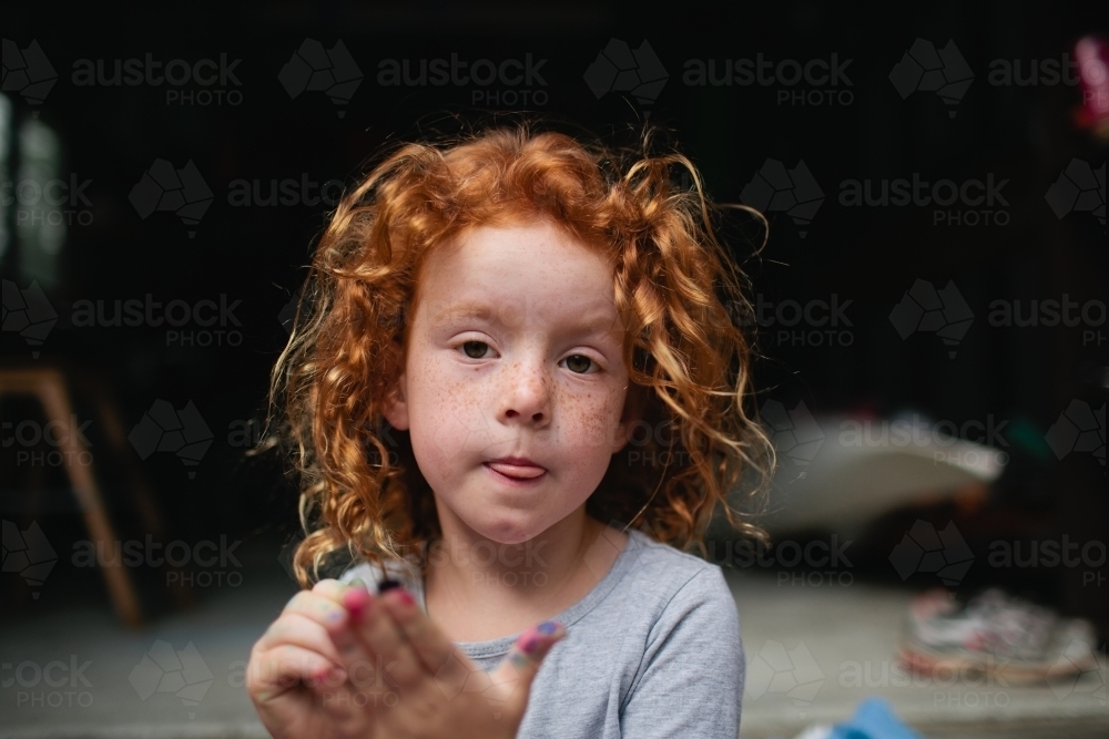 Portrait of a young girl with a serious expression - Australian Stock Image