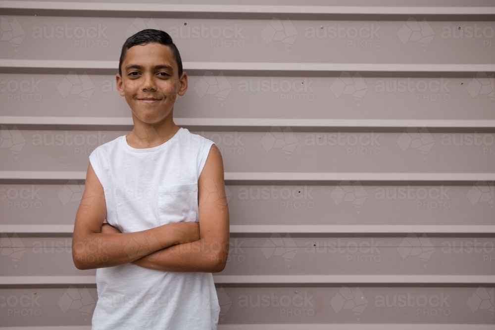 Portrait of a young, smiling first nations boy - Australian Stock Image