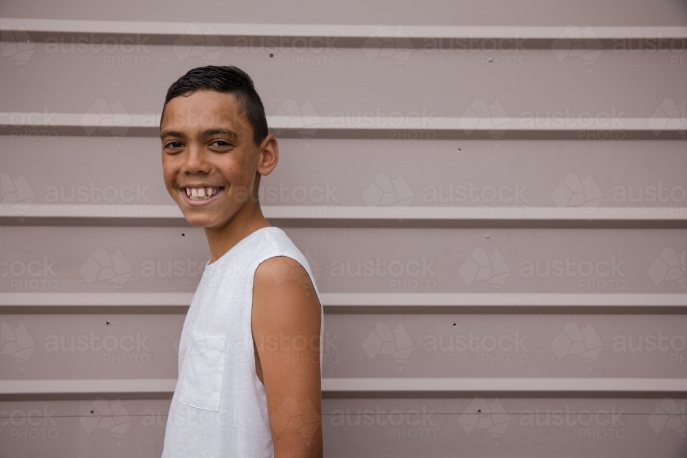 Portrait of a young, smiling first nations boy - Australian Stock Image