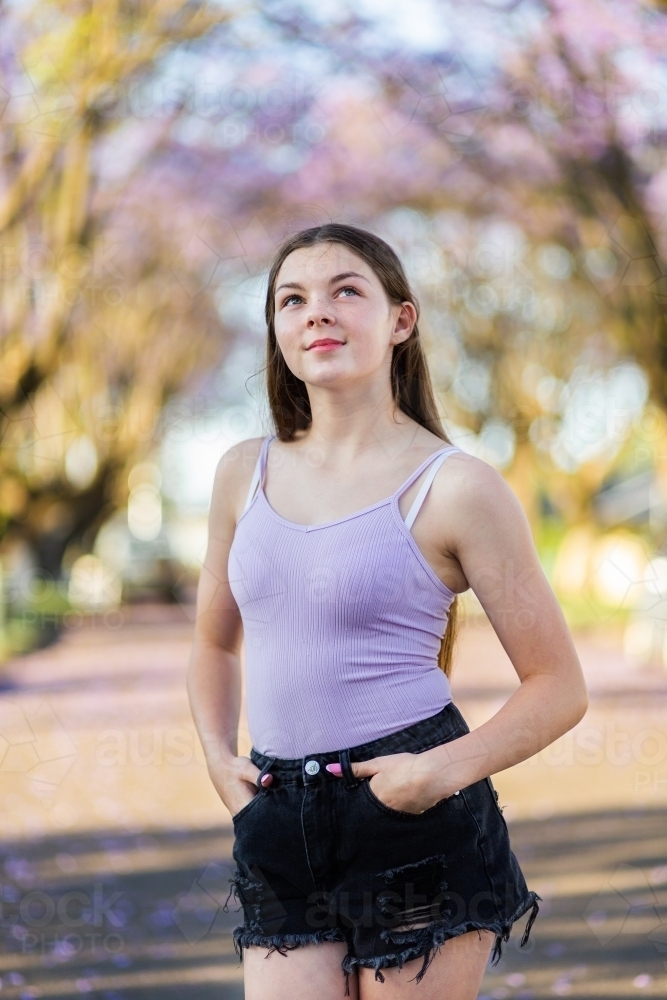 Portrait of a young teen looking to the side - Australian Stock Image