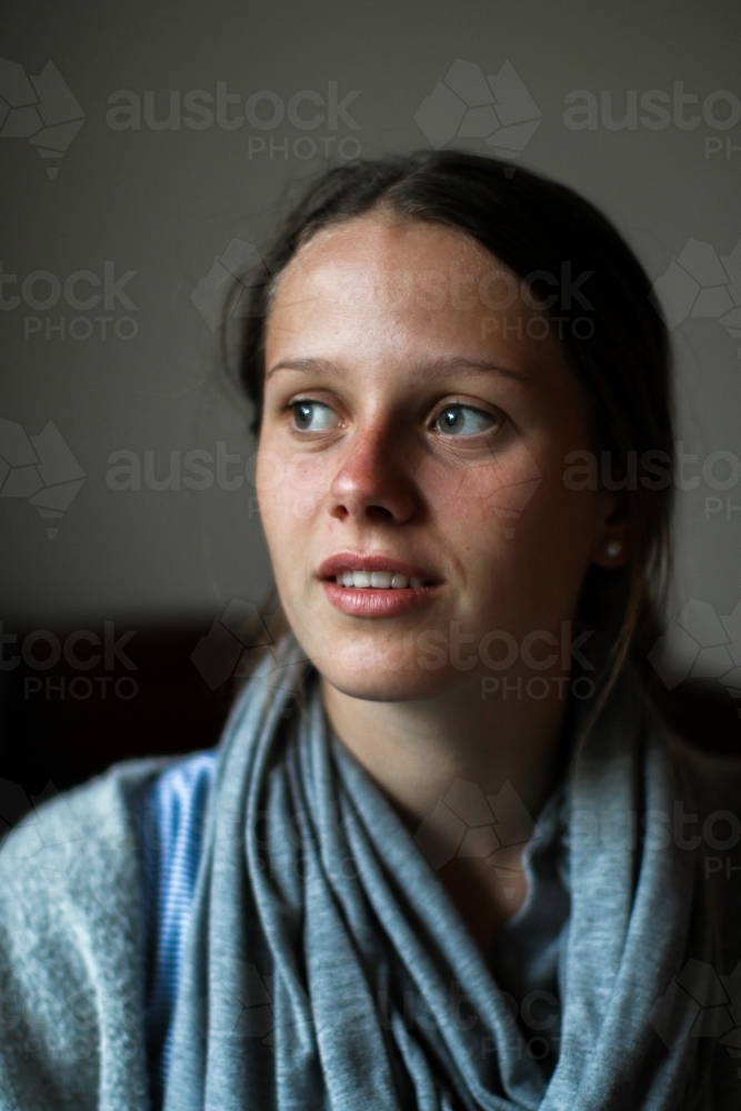 Portrait of a young teenage girl indoors - Australian Stock Image