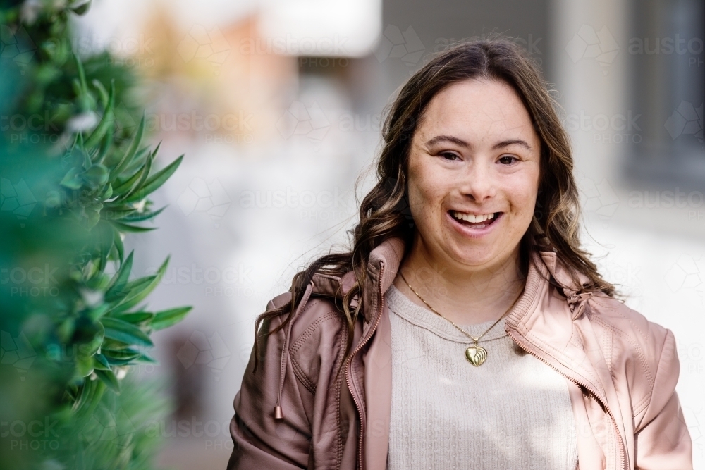portrait of a young woman. from a series featuring a young woman with Down Syndrome - Australian Stock Image