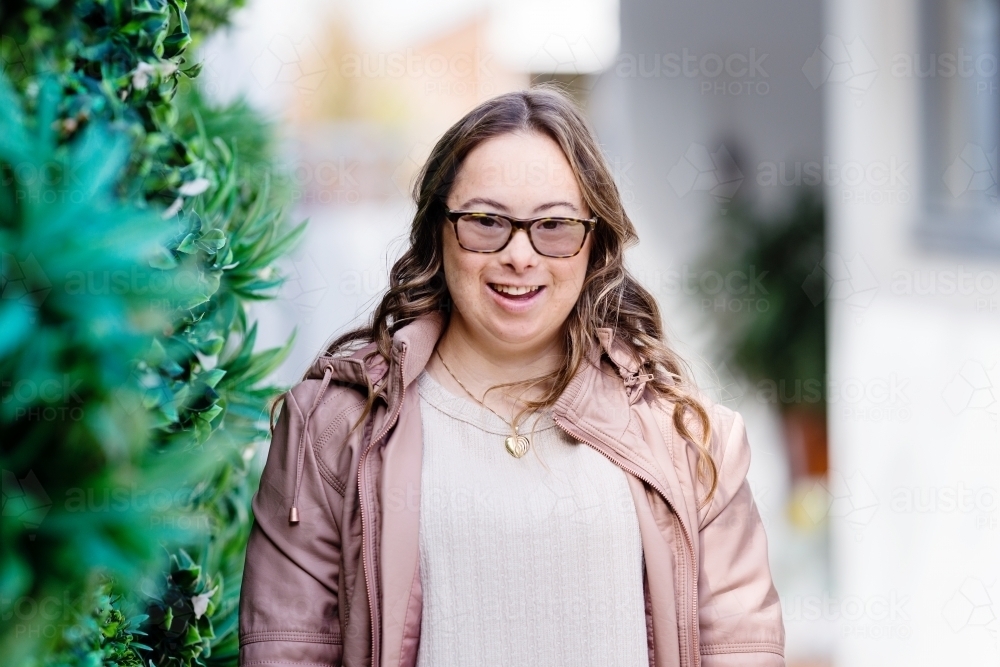 portrait of a young woman. from a series featuring a young woman with Downs Syndrome - Australian Stock Image