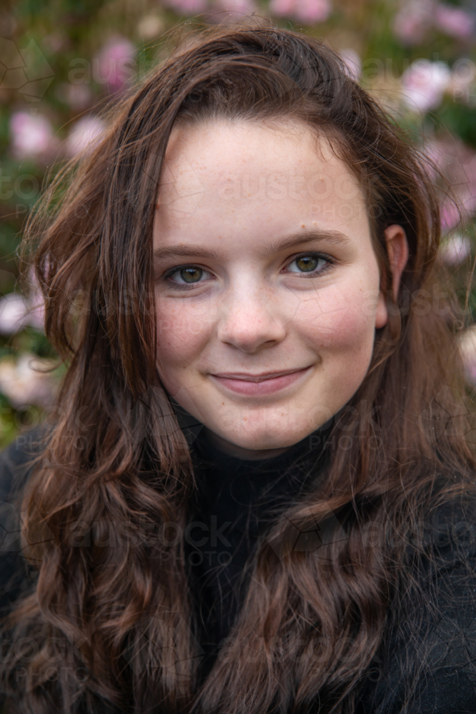 Portrait of a young woman with long hair - Australian Stock Image