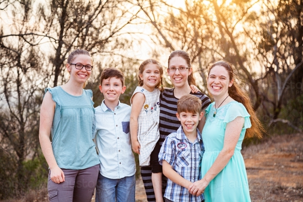 Portrait of brothers and sisters in big family - Australian Stock Image
