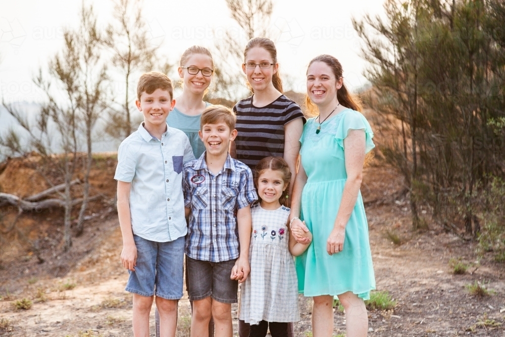 Portrait of brothers and sisters in big family - Australian Stock Image