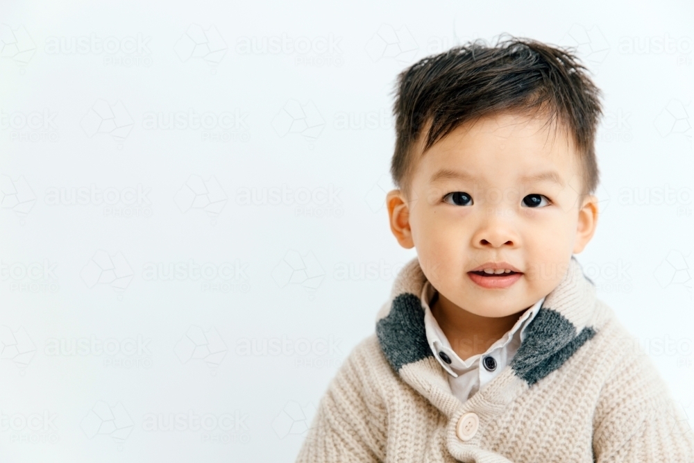 Portrait of cute Asian toddler with copy space - Australian Stock Image