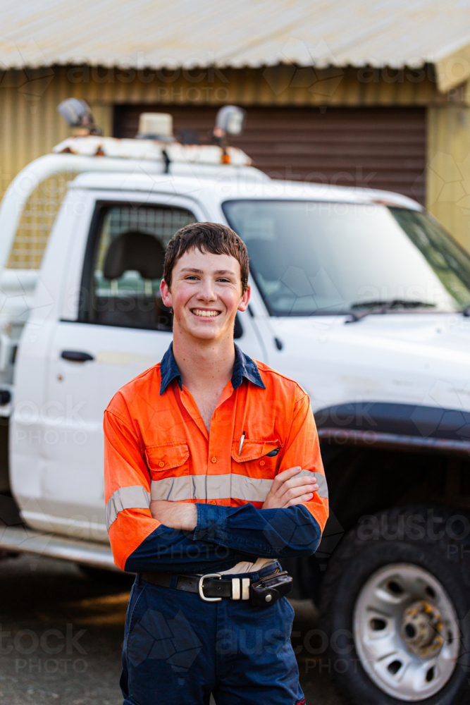 Image of Portrait of happy smiling young male tradie apprentice in high ...