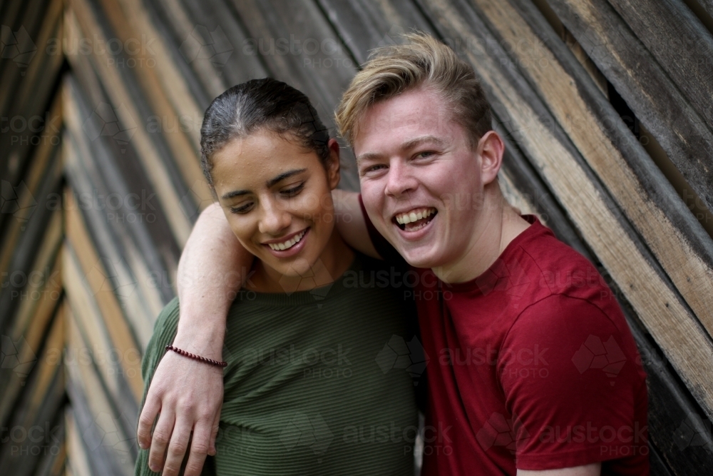 Portrait of happy young mixed race couple - Australian Stock Image