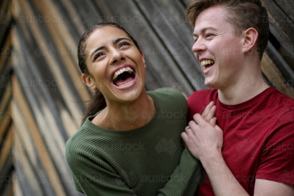 Portrait of happy young mixed race couple - Australian Stock Image