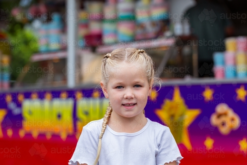 Portrait of little girl at local fair event - Australian Stock Image