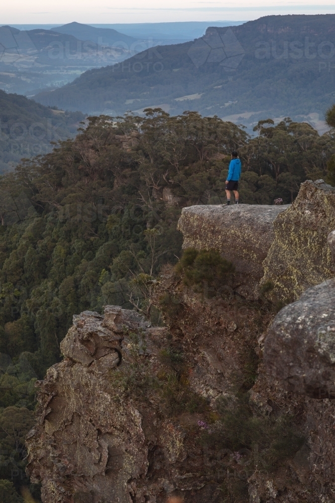 Portrait of man overlooking mountains - Australian Stock Image