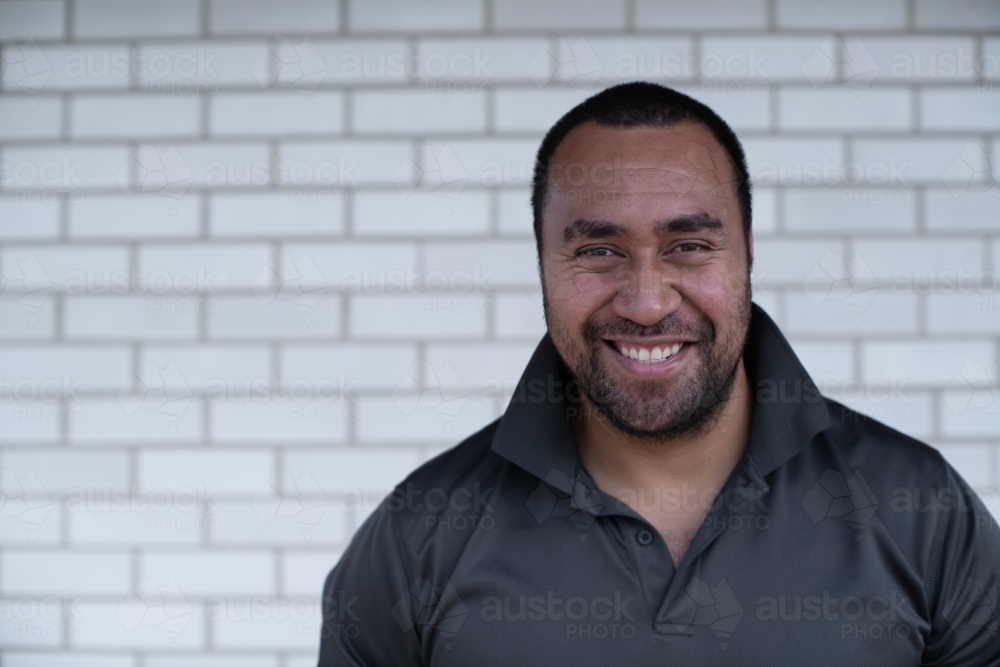 Portrait of man smiling - Australian Stock Image