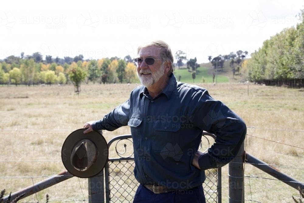 Portrait of middle aged male farmer outdoors on rural property - Australian Stock Image