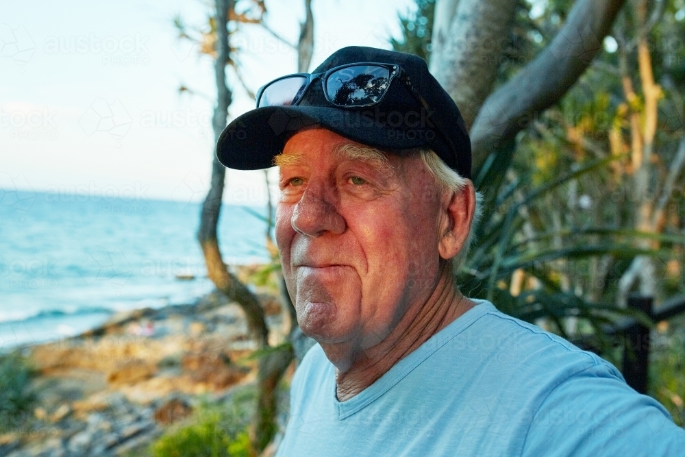 Portrait of middle aged man at the beach - Australian Stock Image