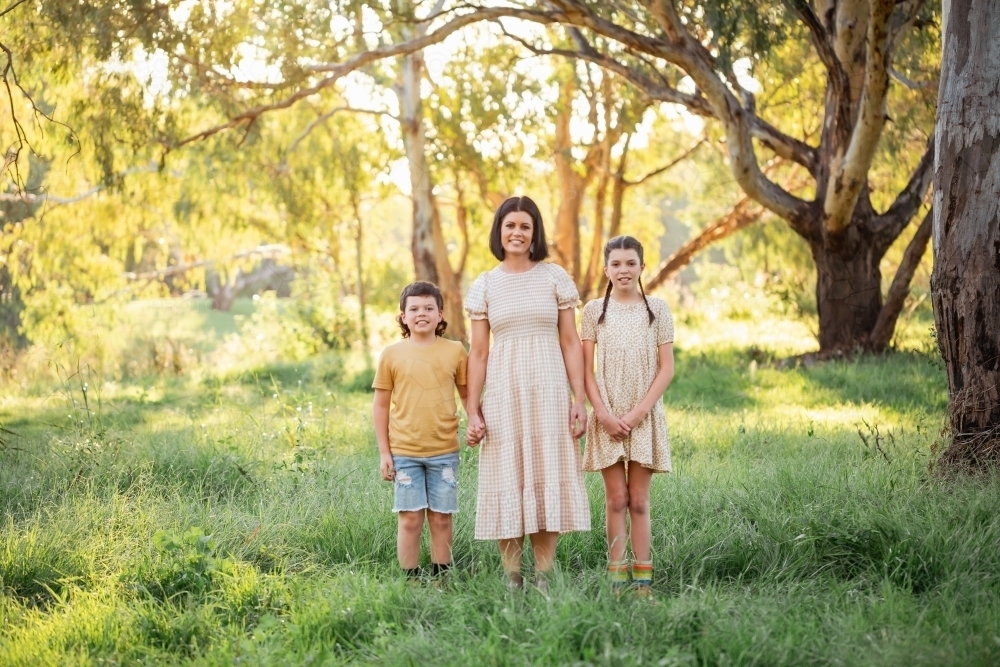 Image of Portrait of mother and children together in Australian bush ...