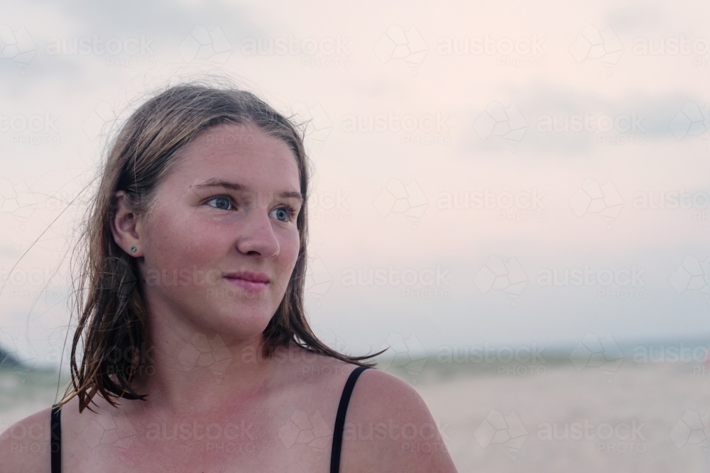 portrait of natural teen girl at the beach - Australian Stock Image