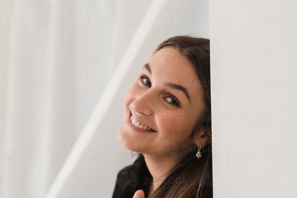 Portrait of smiling female teenager - Australian Stock Image