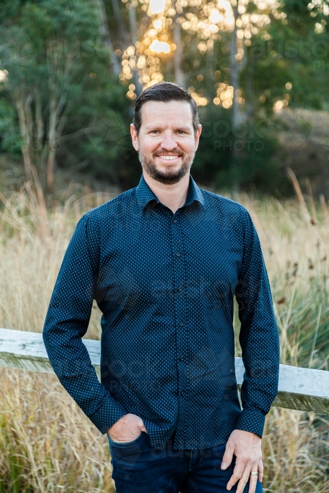 Portrait of well-dressed man standing in the bushland - Australian Stock Image