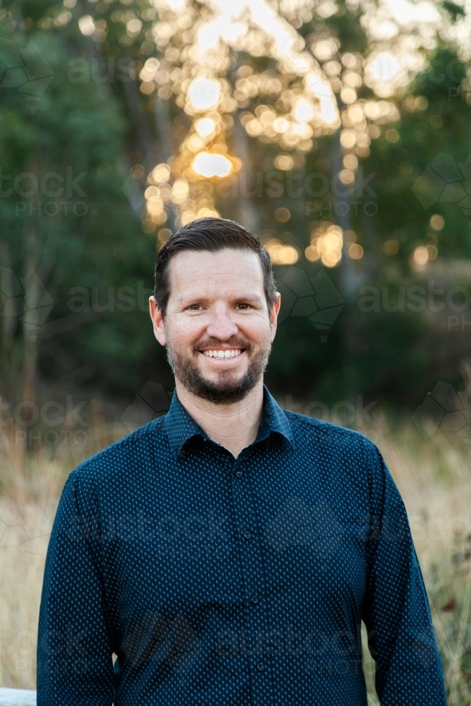 Portrait of well-dressed man standing in the bushland - Australian Stock Image