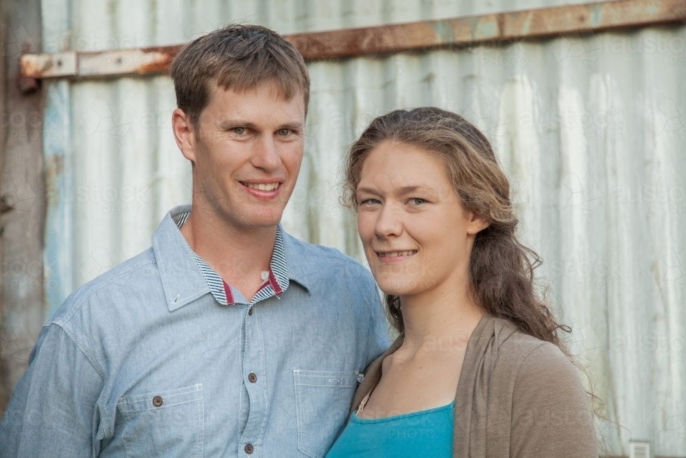 Portrait of young australian couple standing together - Australian Stock Image