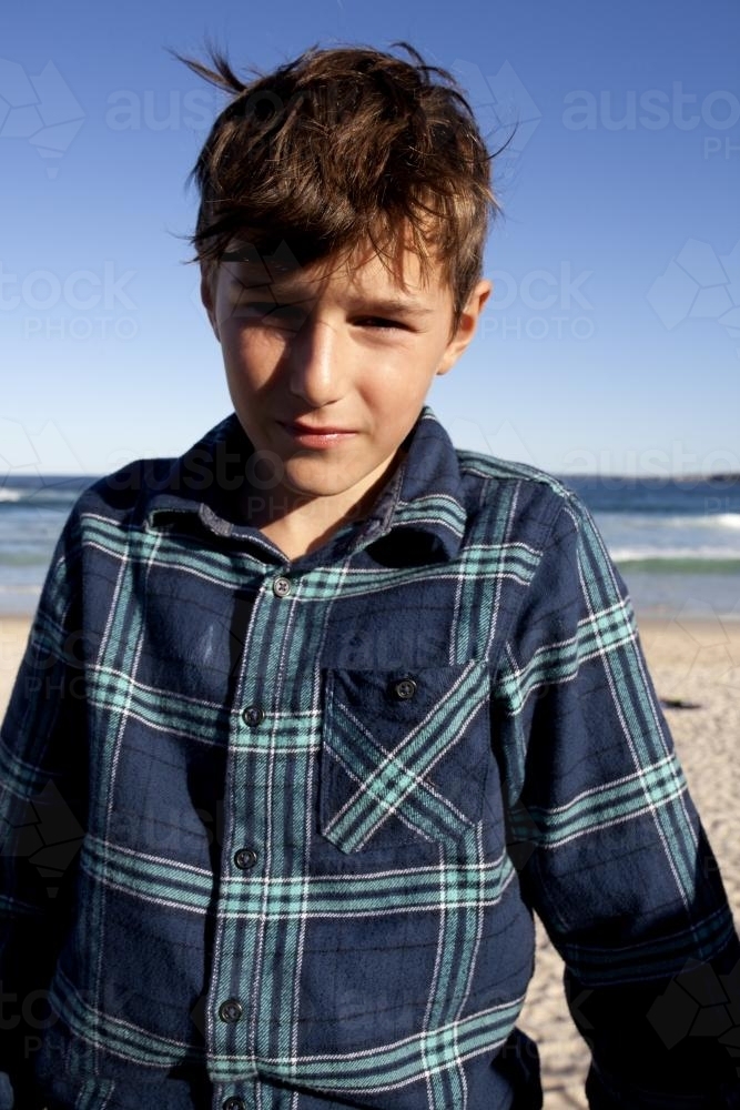 Portrait of young boy at the beach - Australian Stock Image