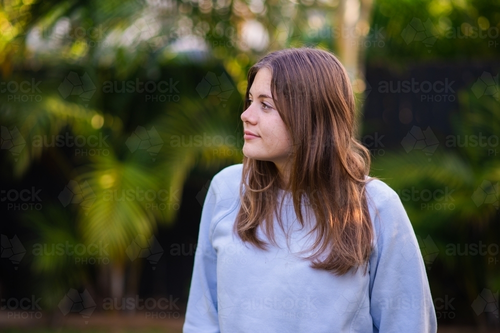 Image of portrait of young teen girl outside - Austockphoto