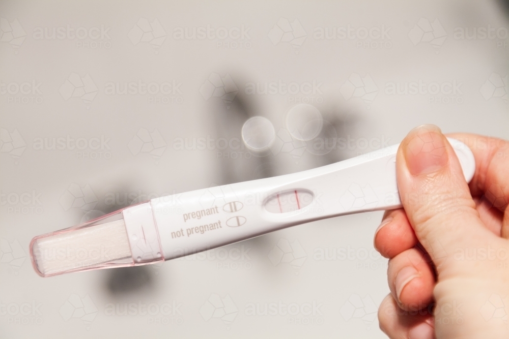 Positive pregnancy test showing two lines - Australian Stock Image