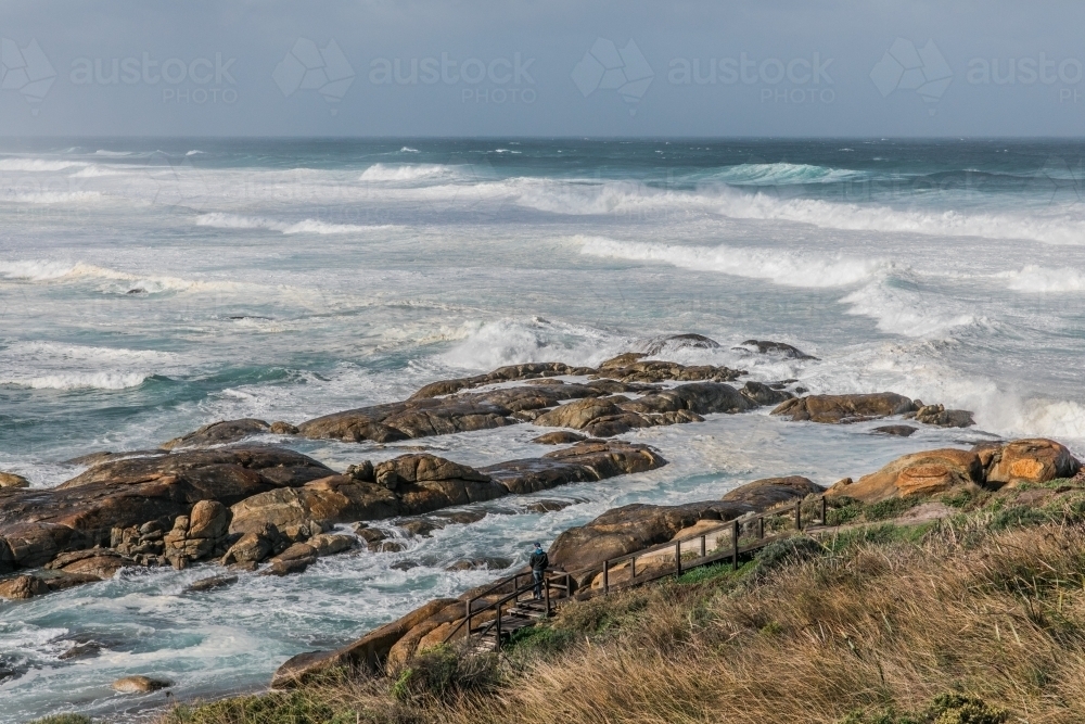 Powerful ocean with coastline and rocks - big waves and swell - Australian Stock Image