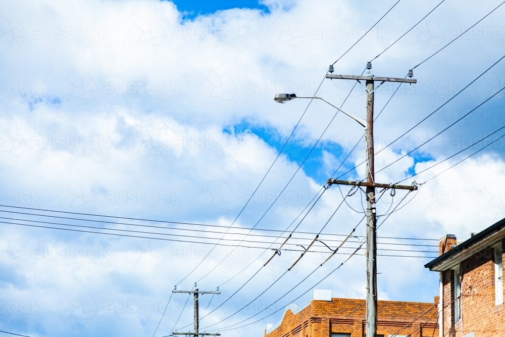 Image of Powerlines crossing above city streets Austockphoto