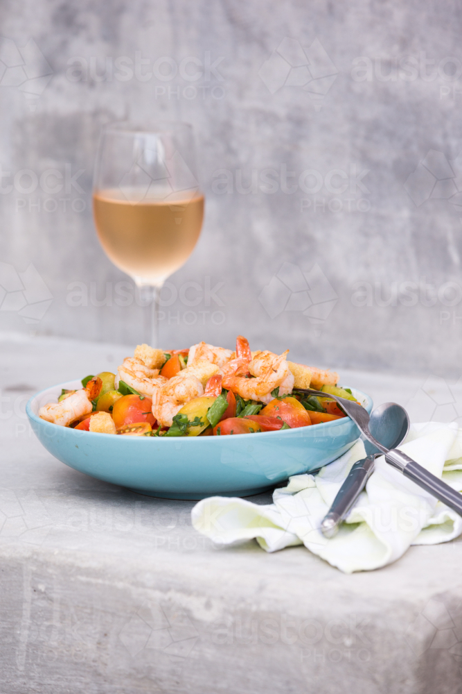 Prawn salad with a chilled glass of rose - Australian Stock Image
