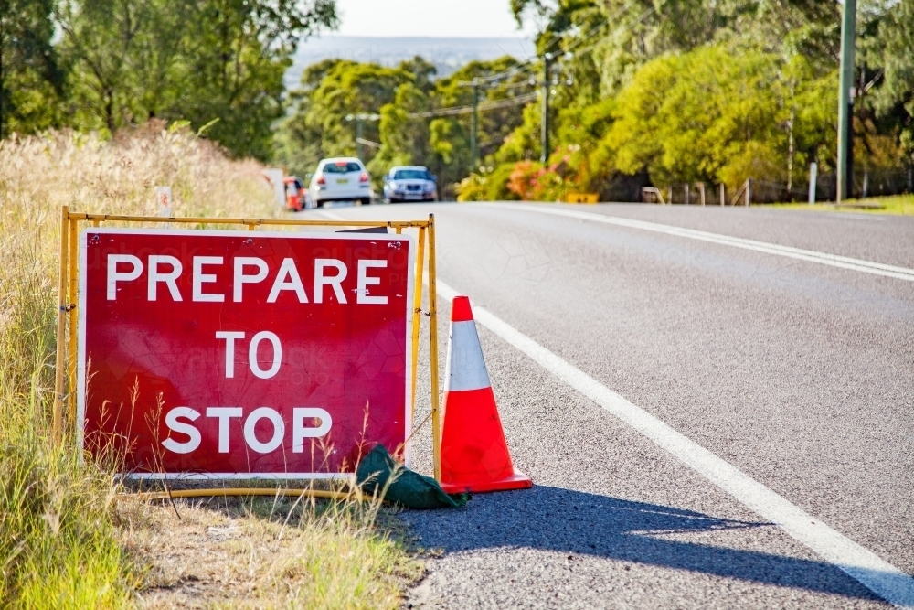 Prepare to stop road work signs on road - Australian Stock Image