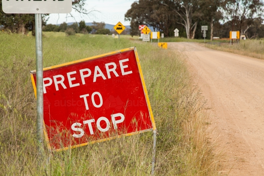 Prepare to stop sign before roadworks and train line - Australian Stock Image
