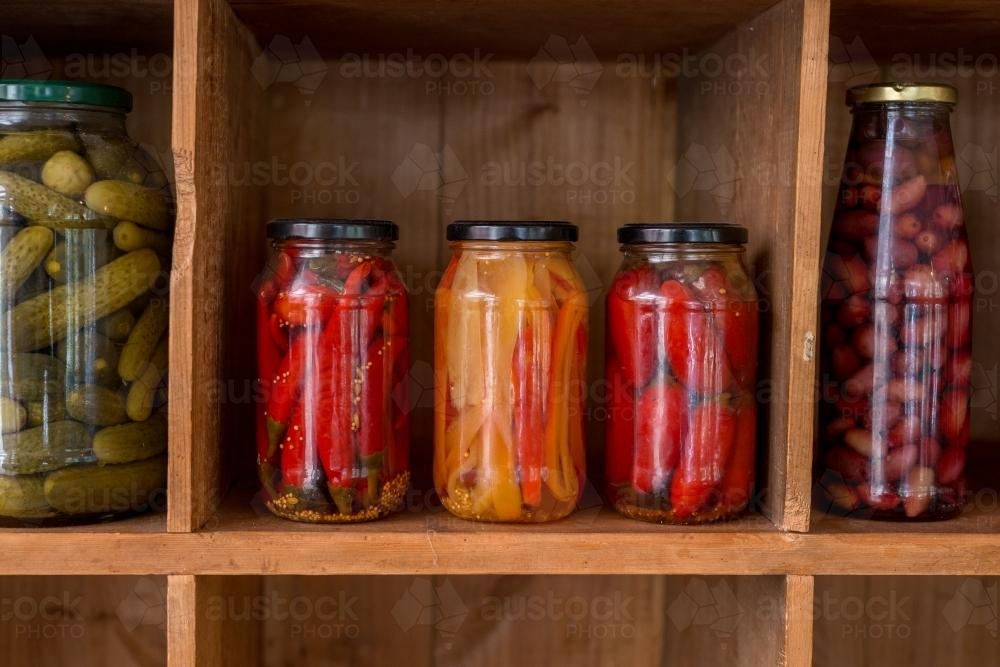 preserved chillies and capsicum - Australian Stock Image