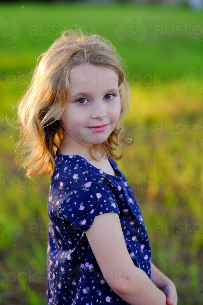 Pretty girl in a field - Australian Stock Image