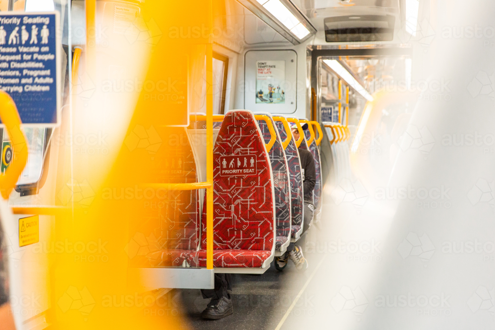 priority seating on a train carriage - Australian Stock Image