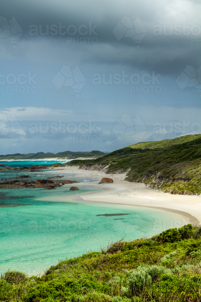 Pristine beach sand alongside the turquoise water at Greens Pool, Denmark, Western Australia - Australian Stock Image