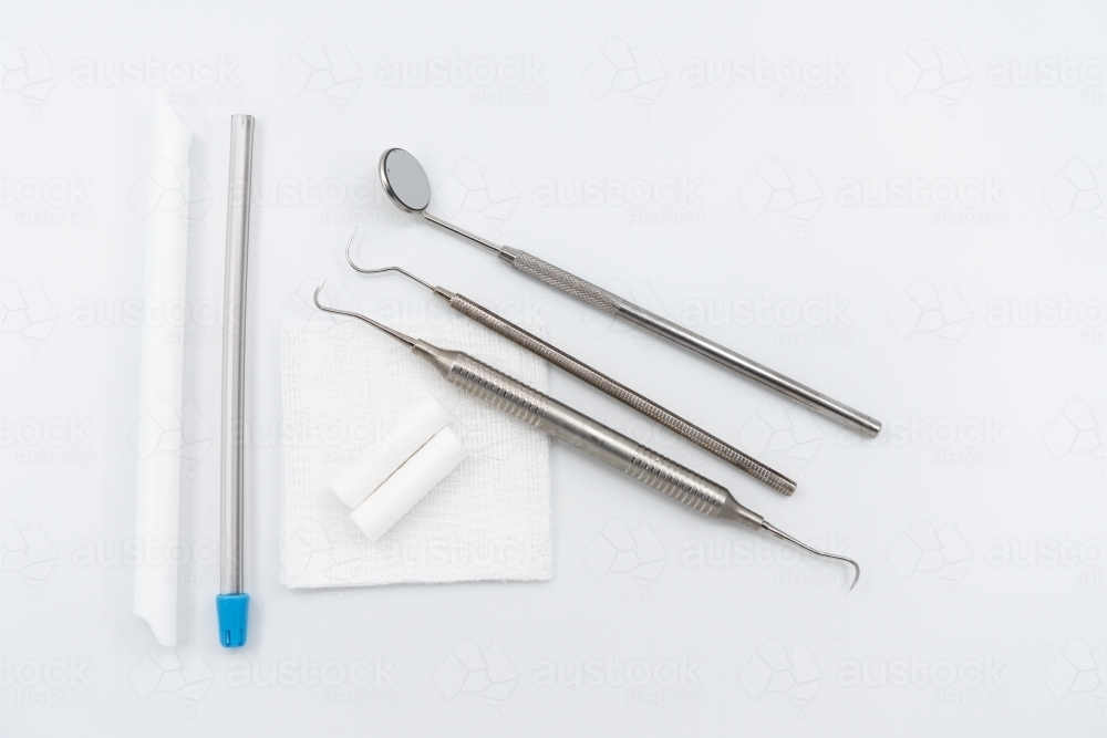 Professional dental instruments on white background - Australian Stock Image