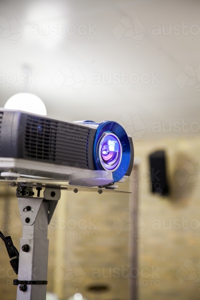 Projector on a stand with copy space - Australian Stock Image