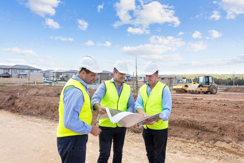 Image of Property developers on-site - Austockphoto